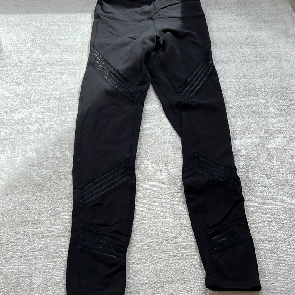 Alo Yoga black leggings with mesh inserts